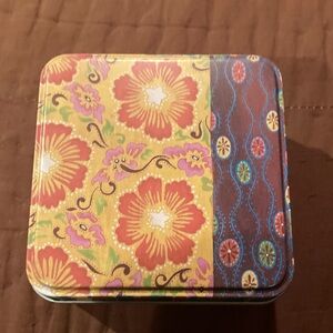 watch by fossil and  Floral Patterned Tin Box